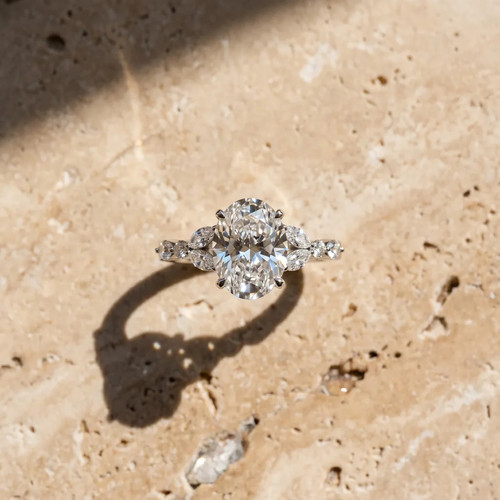 Best Oval Diamond White Gold Ring with Side Stones in New York.jpg
