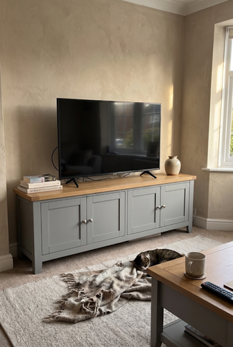 TV console table with four shaker cabinet fronts.png