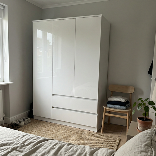 White Wardrobe with Drawers for a Fresh Bedroom.png