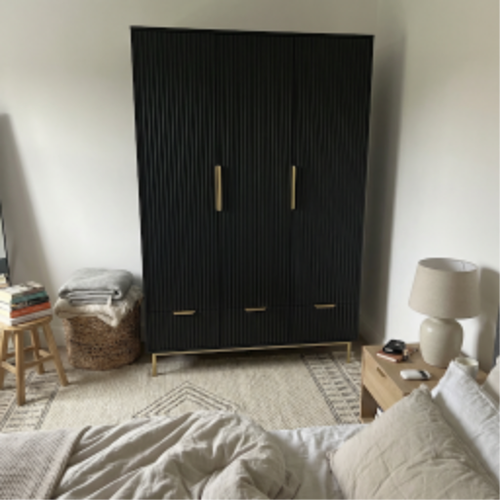 DHS 3 door wardrobe with drawers with grooves and flutting.png