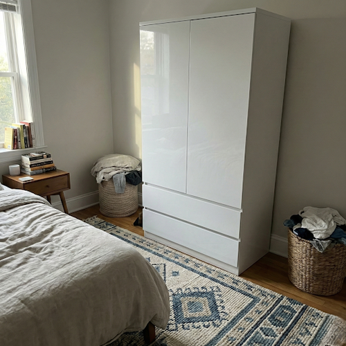 White Wardrobe with Drawers to keep room Bright and Roomy.png