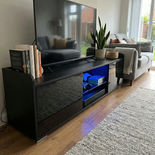 Stylish Black TV Unit with Impressive Storage.png