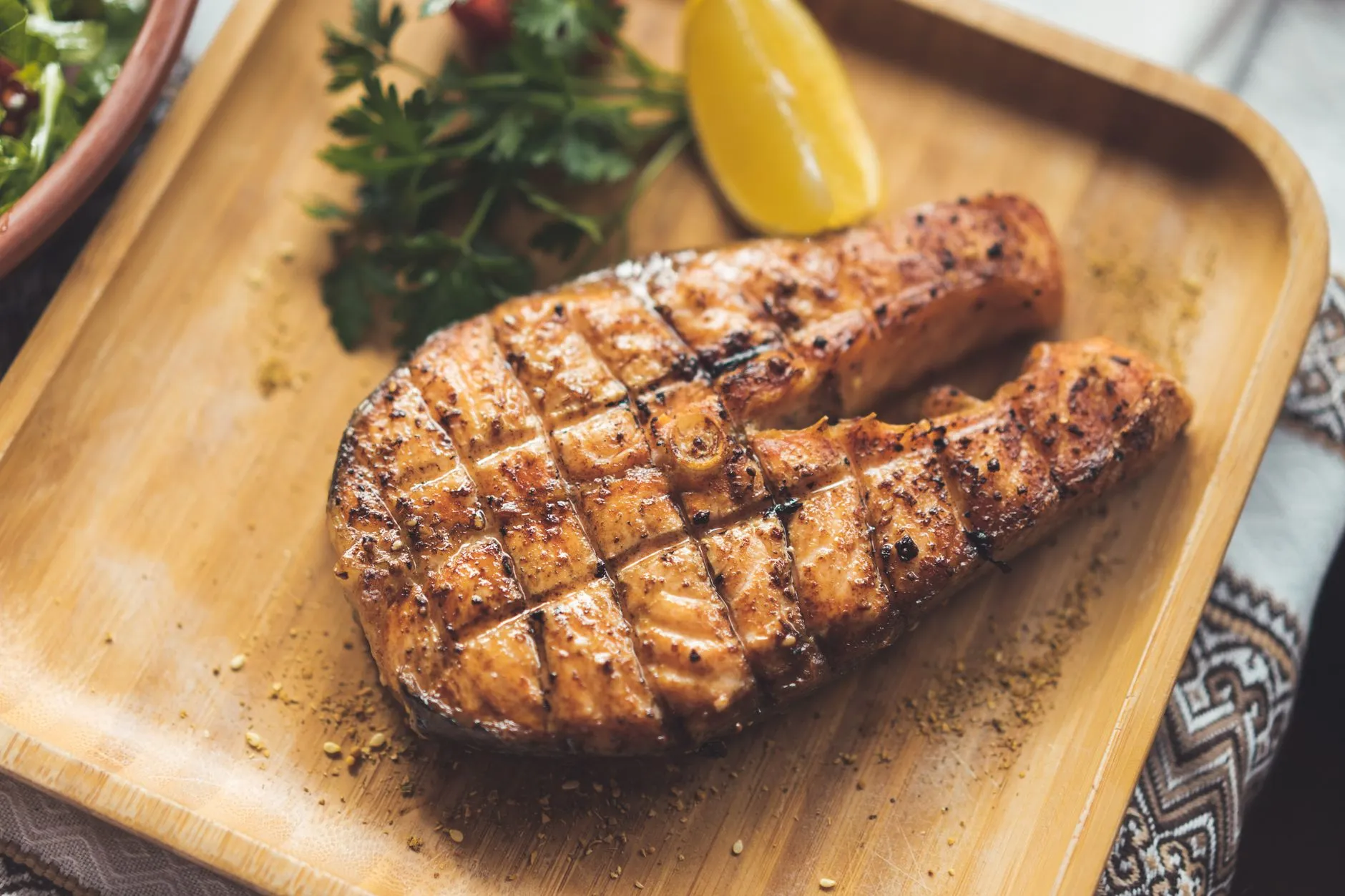 The Incredible Health Benefits of Lemon Herb Grilled Salmon