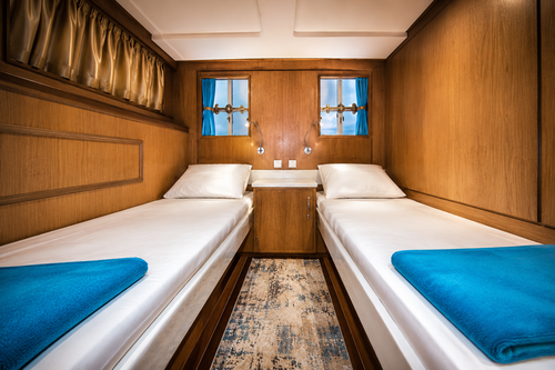 Comfortable guest cabins on cruise yacht