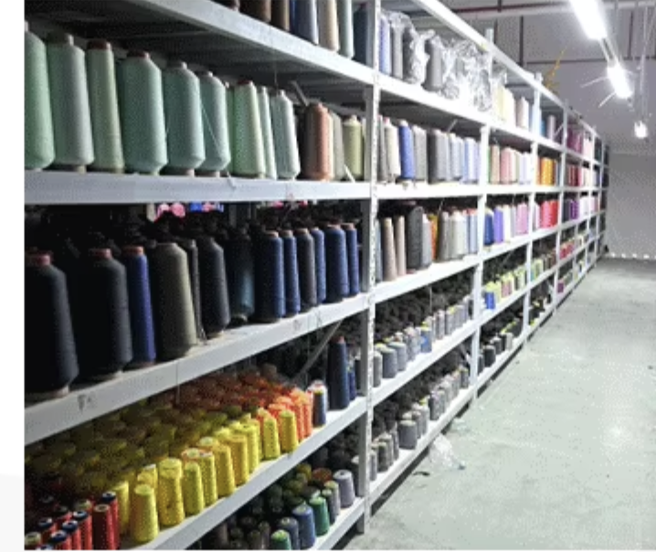 Workers sewing garments