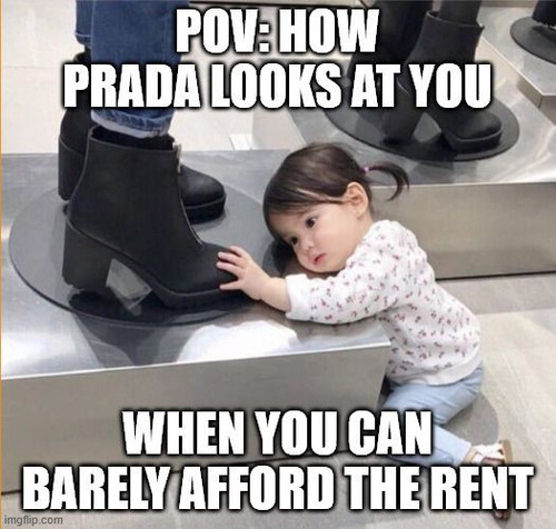How Prada looks at you when your rent is due tomorrow.jpg