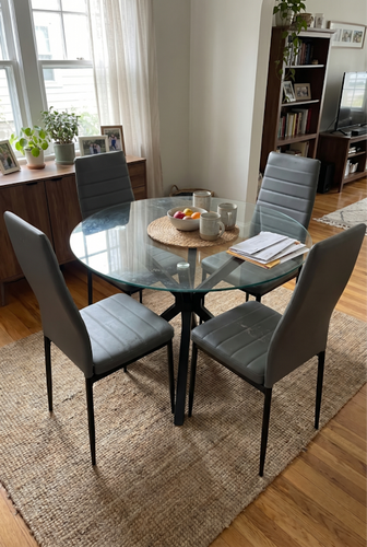Skyra round glass dining table and chairs for an open dining corner.png