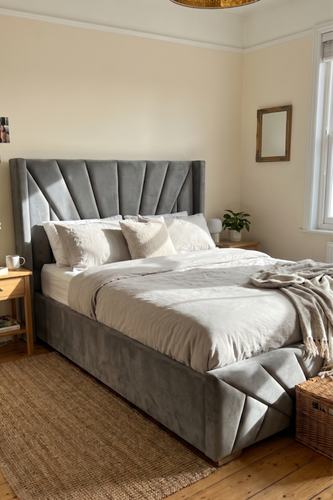 Double ottoman bed with hidden bedding space and Sunrise headboard.png