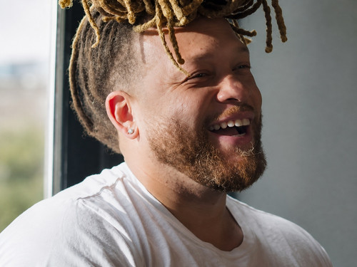 Joyful Laughing Man by the Window.jpg