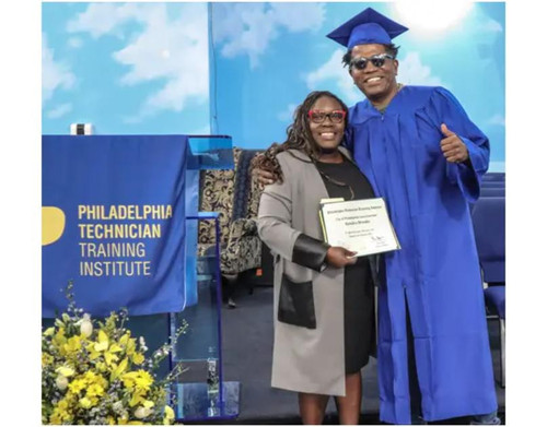 Young Philadelphia student getting hired as a mechanic after completing trade school program at PTTI.jpg