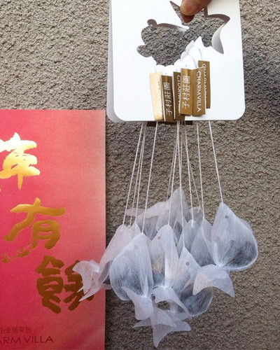 gold fish tea bag charm villa 1.jpg