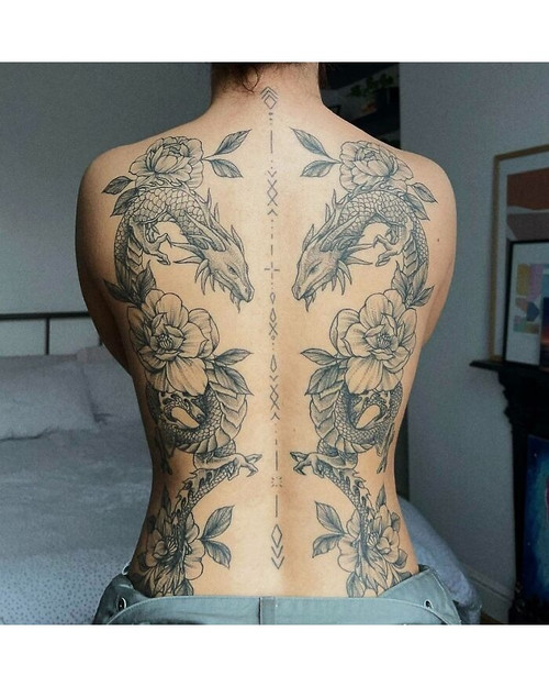 69c544555ca2c creative tattoo design examples 700 bordered.jpg