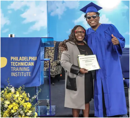 Young Philadelphia student getting hired as a mechanic after completing trade school program at PTTI.webp