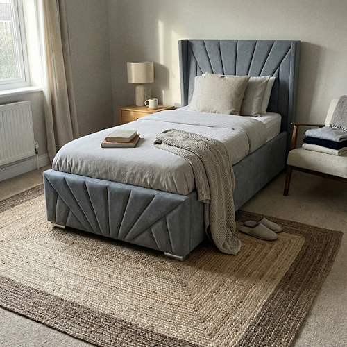 A grey single bed ottoman that's ideal for guests.png