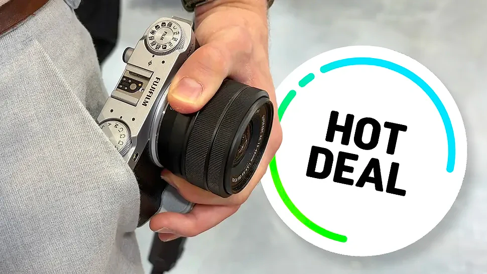 Fujifilm X-M5 being held in man's hand with Hot Deal flash