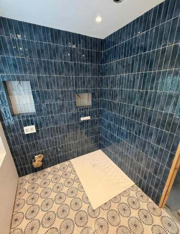 How Professional Bathroom Fitters Achieve a Perfect Tile Finish.jpg