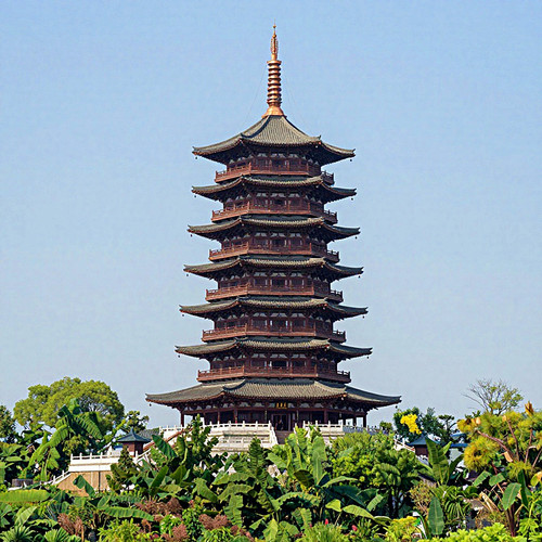 A photorealistic architectural photograph of the Medicine Buddha Ten Thousand Buddhas Pagoda, Mahabo.jpg
