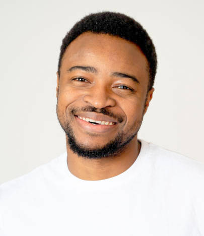 Portrait of smiling man having fun and joy smiling and laughing at the camera and pointing to someth.jpg