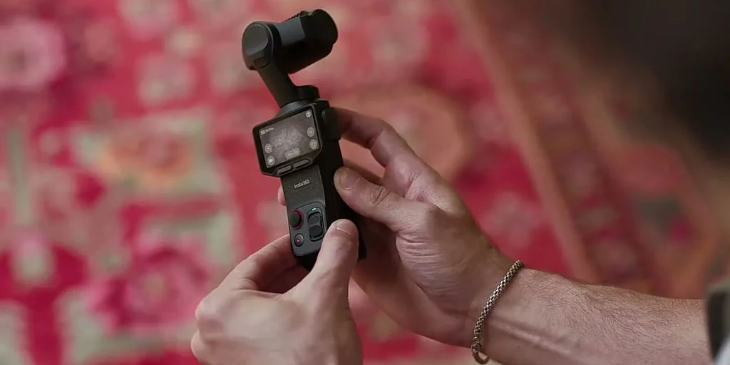 A person holding a camera