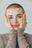 young positive woman with many stickers on face 3851309 32x.jpg