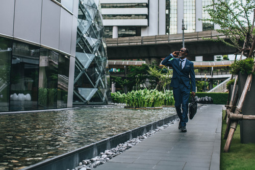 004 businessman modern city buildings.jpg