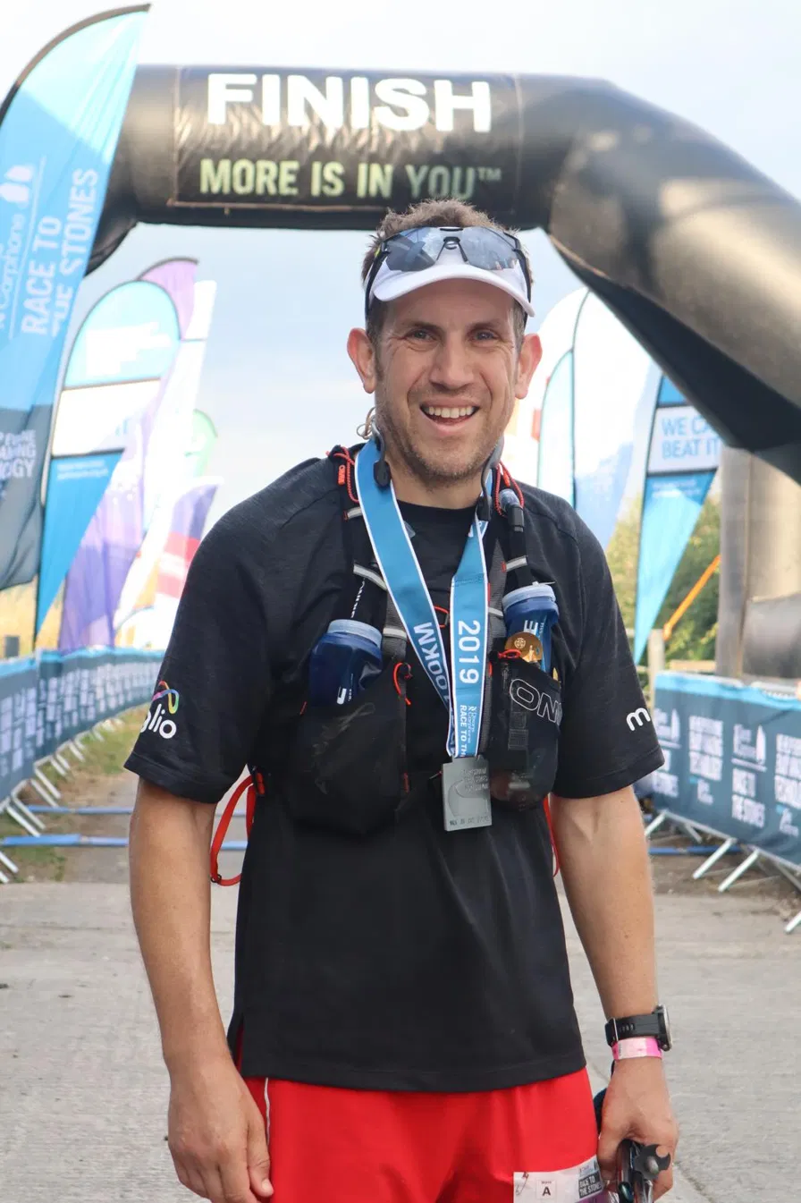 At the finish line under the Race to the Stones arch