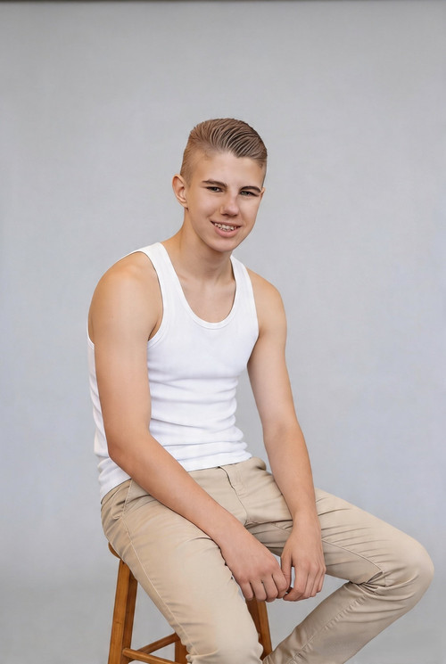 dreamina 2026 04 19 9161 Change the man's blue shirt to a classic....jpg