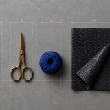 Crafting Tools and Blue Yarn Flat Lay