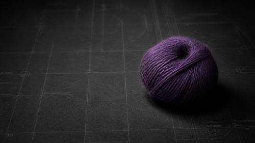 Purple Crochet Yarn on Dark Blueprint.jpg