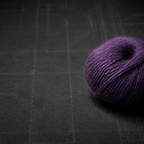 Purple Crochet Yarn on Dark Blueprint