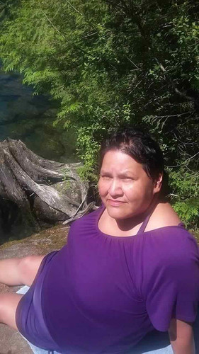 Susan Summer 2025 at Gold River swimming hole Aloutlee lake bc.jpg