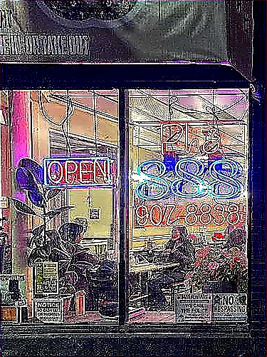 Sharp closing photo of a successful restaurant storefront with bold signage, fresh exterior colors, and a bright planning workspace visible through clear windows