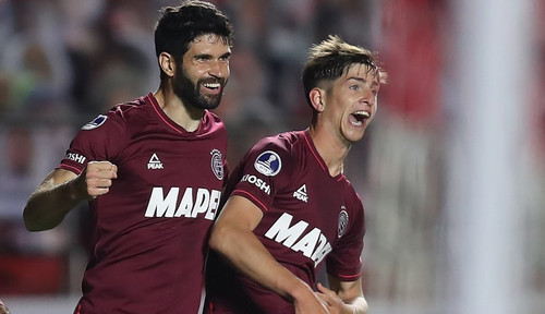 Argentina's Lanus Nicolas Orsini (L) celebrates with Argentina's Lanus Tomas Belmonte  after scoring.jpg