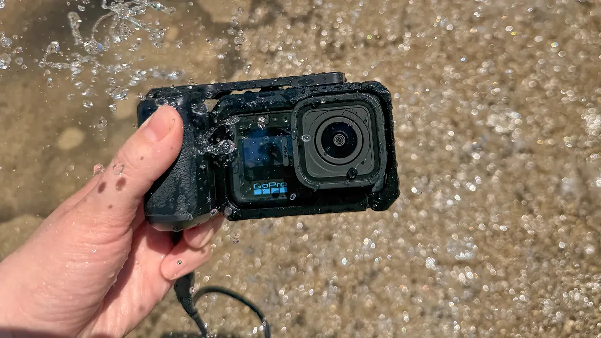The GoPro Mission 1 Pro with the point-and-shoot grip at a splash park