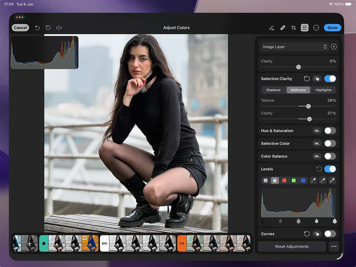 Shot of the Photomator workspace on an iPad. The Selective Clarity panel has been toggled open and we&rsquo;ve boosted the clarity of a model portrait&rsquo;s midtones.
