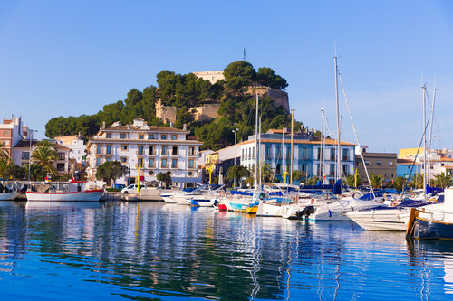 Denia Port with castle hill and marina boats in Alicante province Spain.jpg