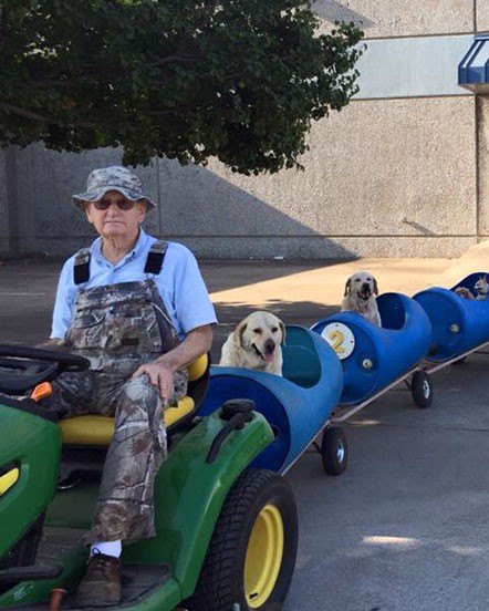 rescued dog train tractor stray eugene bostick 6.jpg