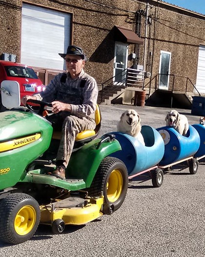 rescued dog train tractor stray eugene bostick 7.jpg