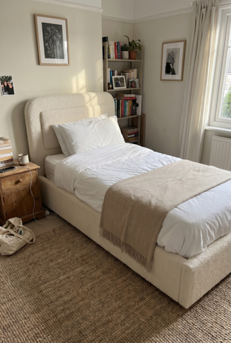 Ottoman single bed for textured curved-headboard storage.png