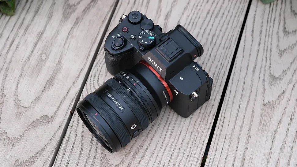 Sony A7 V camera on a wooden surface