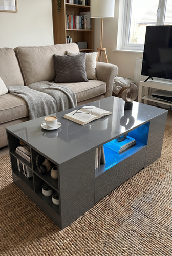 Coffee table with storage from DHS with blue LED shelving.png