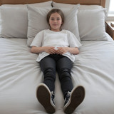 Little sister chilling in bed