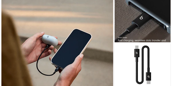A person holding a phone and a charger