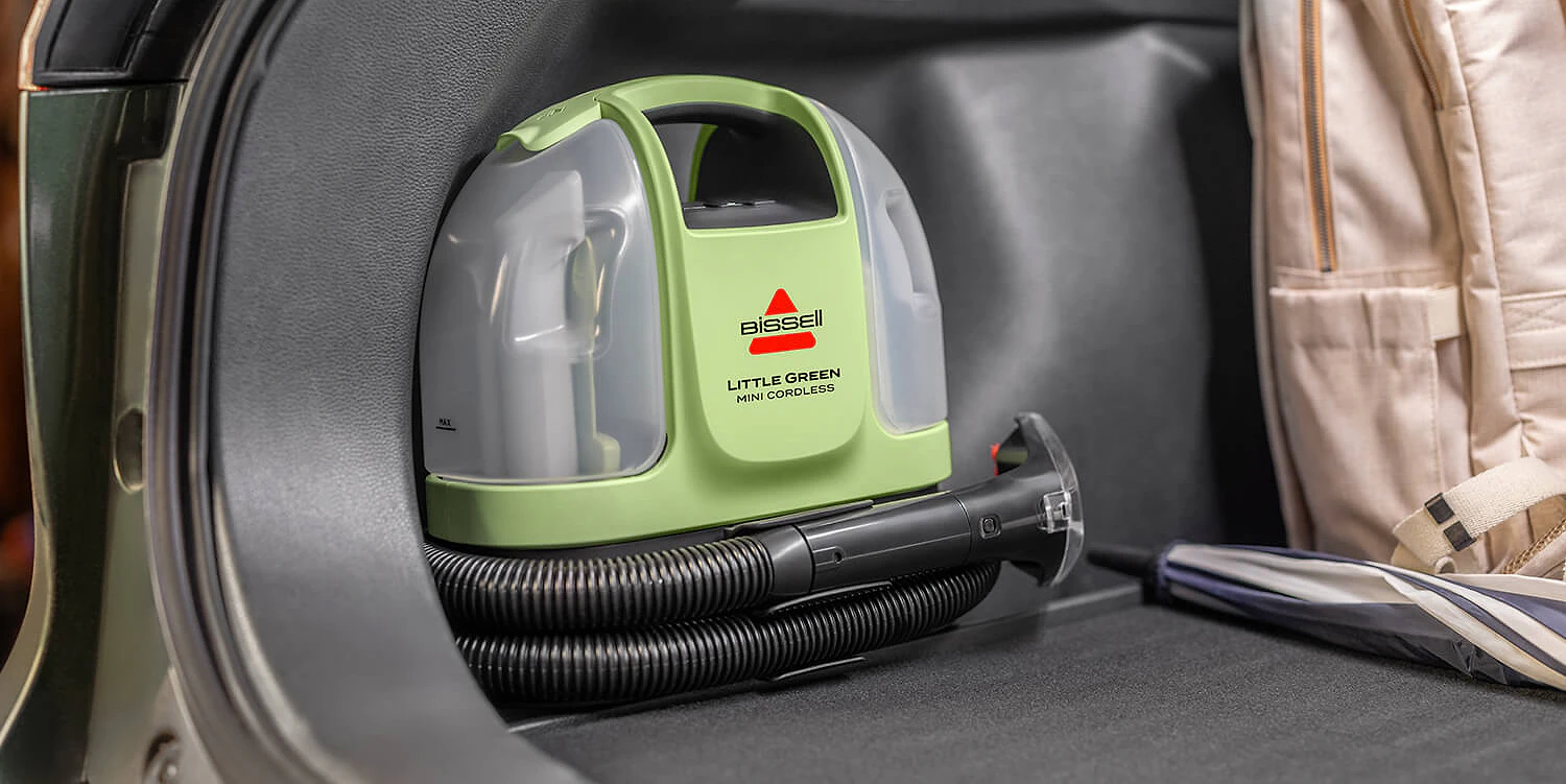 A vacuum cleaner on a car