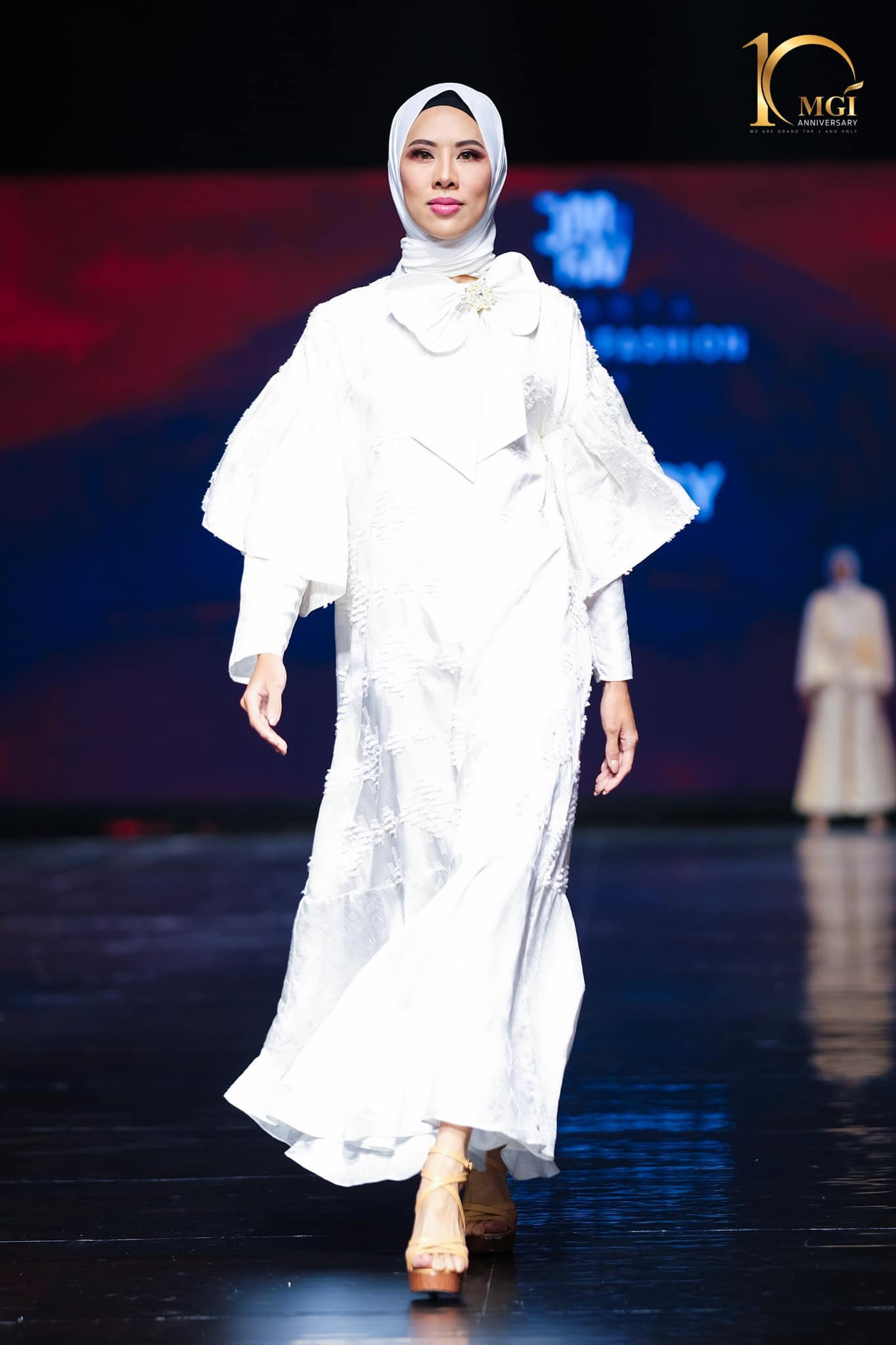 candidatas a miss grand international 2022 durante muslim fashion week. - Página 6 DHLVUb