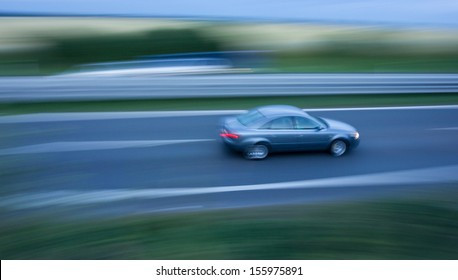 fast going car on highway 260nw 155975891.jpg