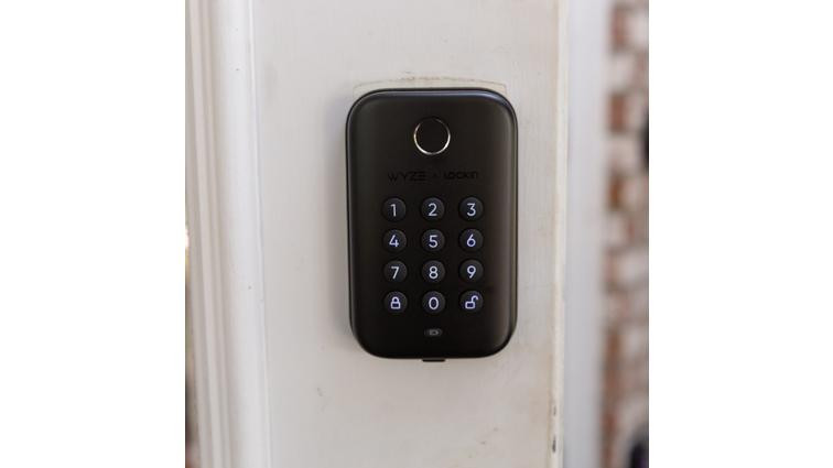 None A keypad door lock on a door