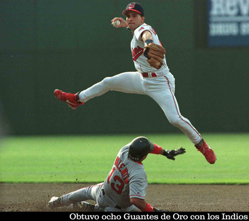 Cleveland Indians shortstop Omar Vizquel jumps to avoid Boston Red Sox's John Valentin after forcing.jpg