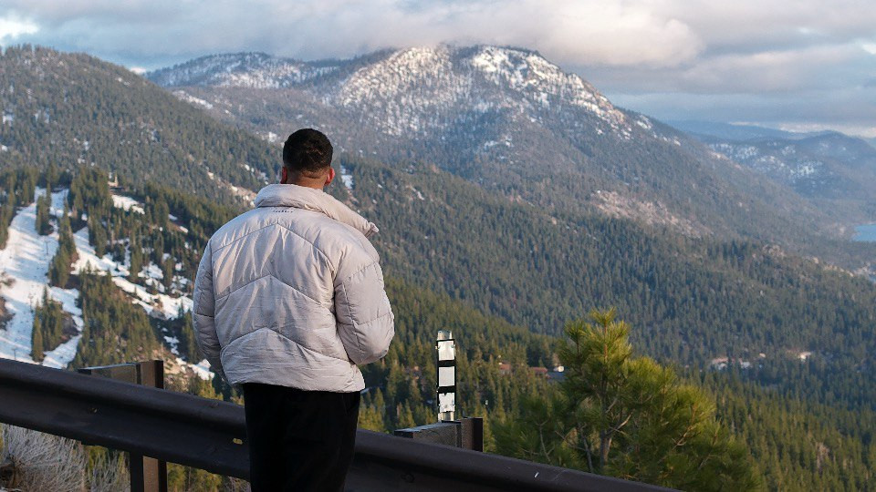 Person meditating outdoors