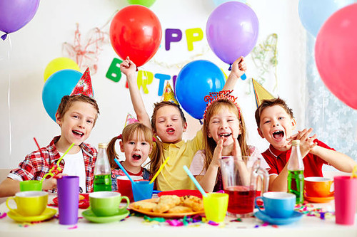 Group of adorable kids having fun at birthday party.jpg